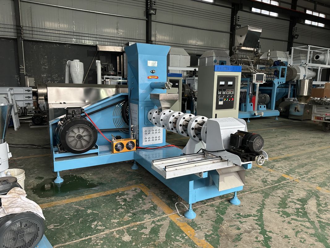 0Línea de producción de pellets para piensos para animales con materias primas para harina de hierba y instalación de guías de ingenieros.